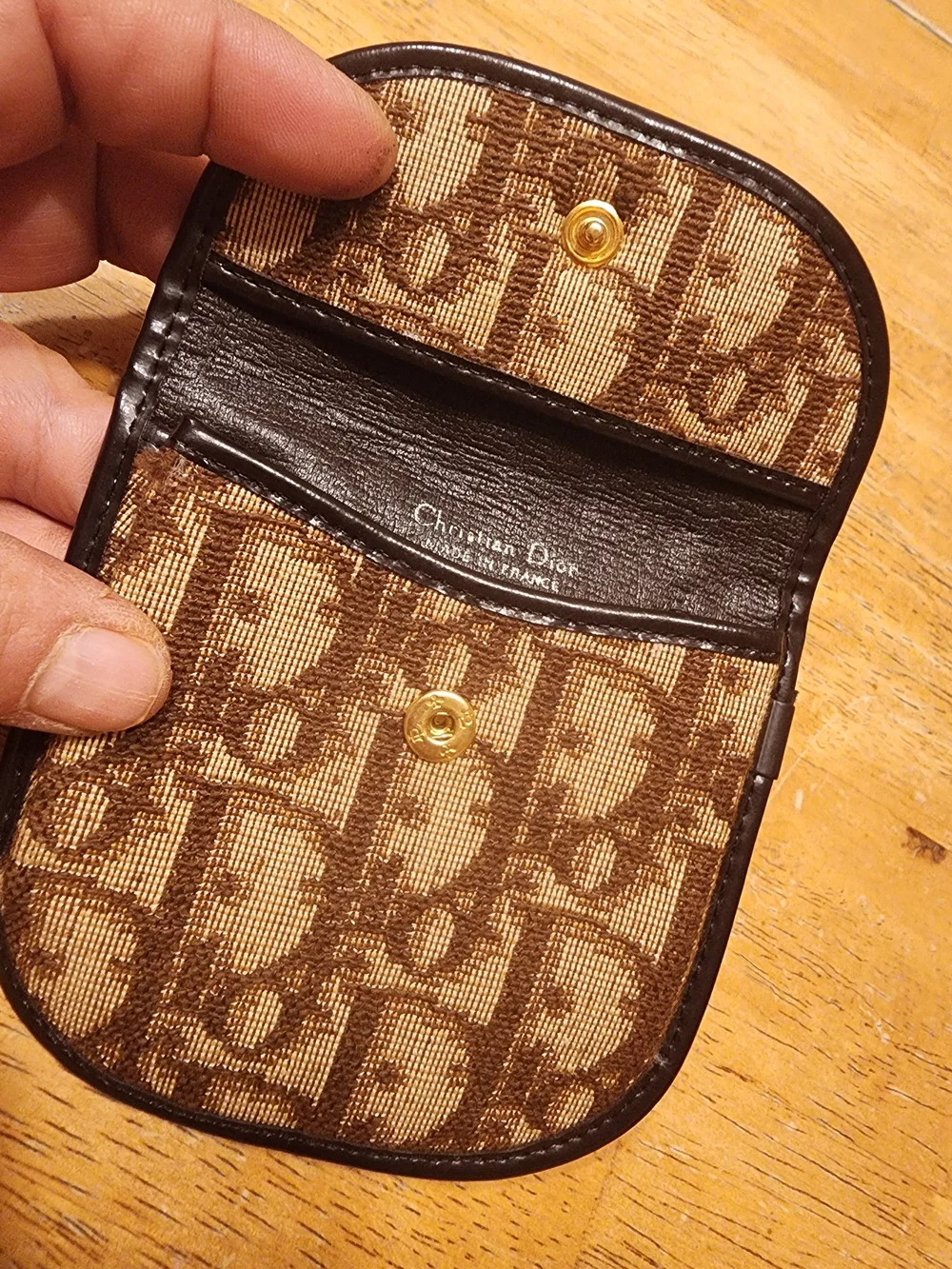 vintage Christian Dior coin purse features the iconic brown Trotter canvas mono